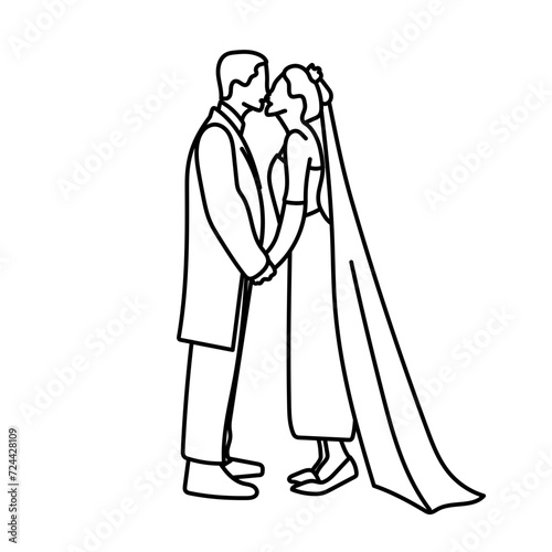 Un couple de mariés s'embrassent