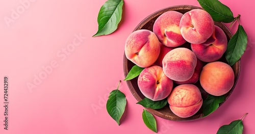 Peaches in the upper portion on a wooden plate against a soft pink backdrop, space, Generative AI.