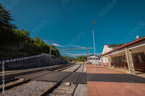Train station of Kolasin in Monte negro, on the route to famous tain line Beograd - Bar. Early morning, empty station. photo