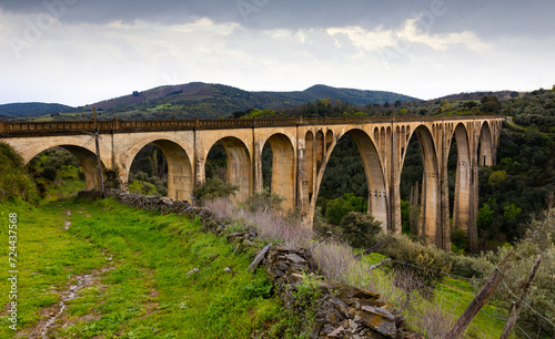 Picturesque view of old railway Guadalupe Viaduct, Extremadura, Spain © JackF