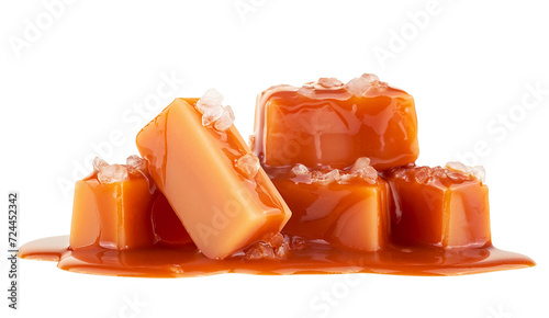 Delicious candies with caramel sauce and sea salt isolated on a white background