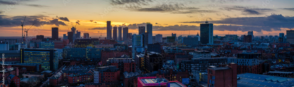 Panoramic aerial image of Manchester Skyline at dusk 