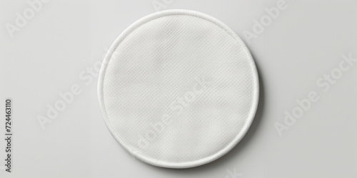 Three white hygienic cotton disks photo