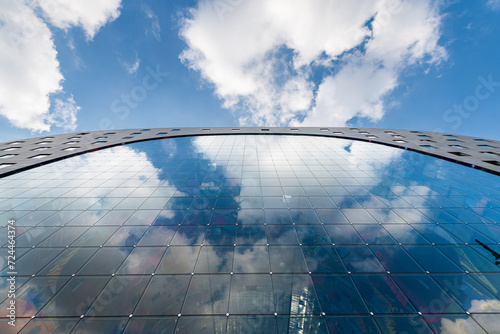 View of the sky reflected on the window of the MARKTHAL covered market, Rotterdam, Holland, The Netherlands photo