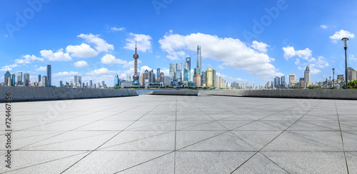 Empty square floor and city skyline with modern buildings scenery in Shanghai. Panoramic view.