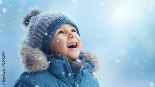 Little Boy in Blue Jacket and Hat