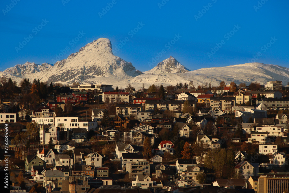 northern city with mountains in the background