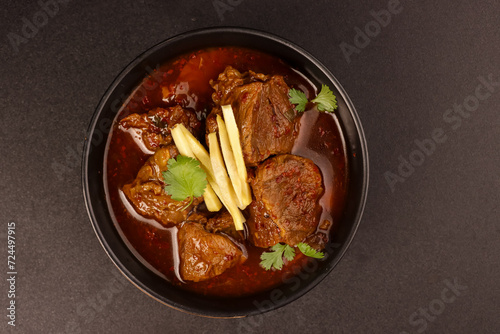 Nihari or Beef Shank Stew is Indian Beef Stew with Large Chunks of Beef Shanks in a Gravy Sauce. photo