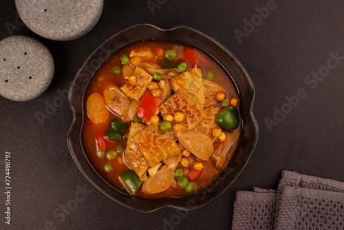 Callos is a Stew made of Ox Tripe, Smoked Sausage, Beans and Bell Peppers in Tomato Sauce. One of the Influences of Spanish Colonization on Filipino Cuisine.