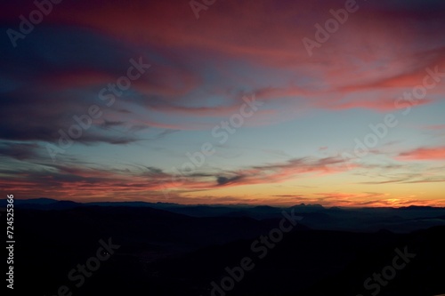 Twilight Hues over Mountains © Wirestock