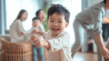 Happy child dancing with family in big cozy room. 