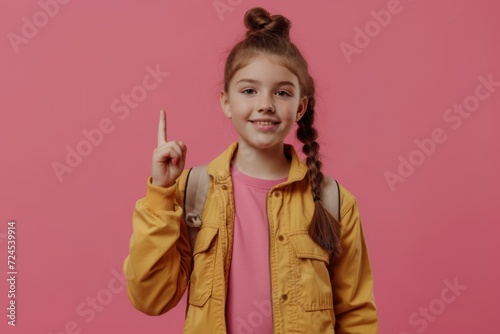 Close-up portrait of her she nice attractive lovely glad cheerful cheery girl pointing forefinger