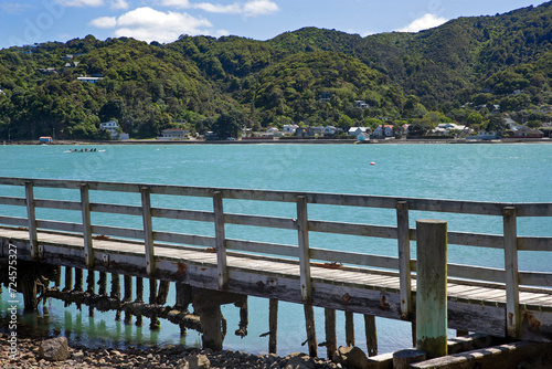 Pier. Wooden jetty. Eastbourne New Zealand. Wellington Harbour. Coast. Rona Bay wharf.