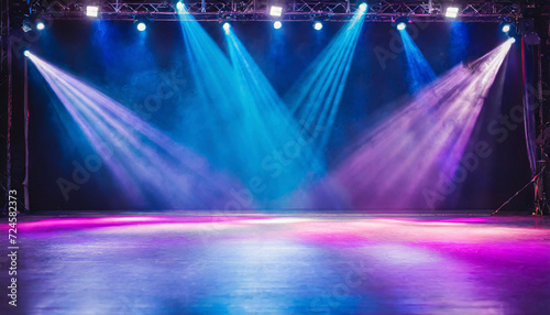 Modern dance stage with blue and purple light background with spotlight illuminated for modern dance production stage.