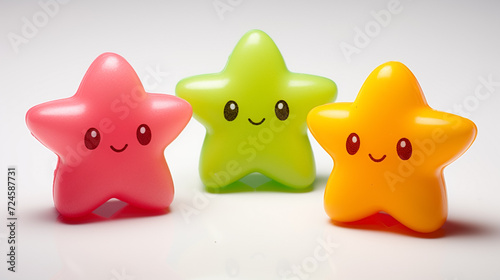 cute group of colorful smiley toy stars, children's toys and gifts, on white isolated background 