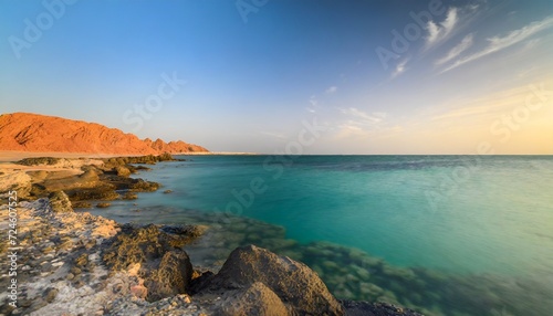 red sea rocky coastline in saudi arabia photo
