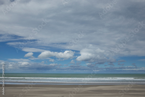 Beach at Castle point coast New Zealand. Pacific Ocean. Clouds.