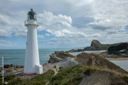 Lighthouse on rocks. Castle point coast New Zealand. Pacific ocean.