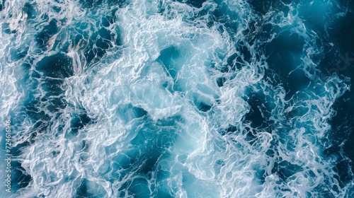Top view of blue frothy sea surface.