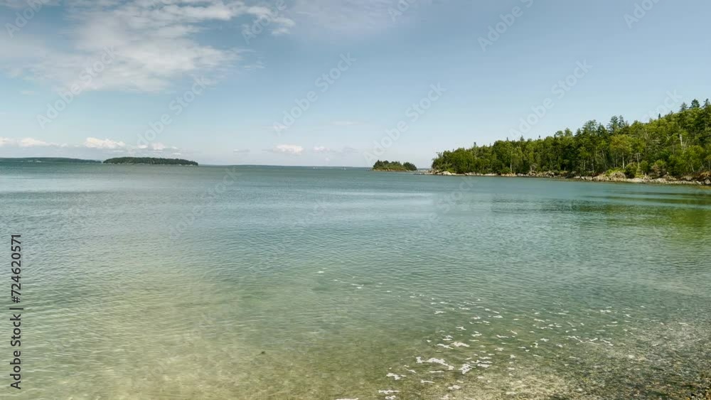 Coastline and pebbled beach, Maine, New England, US. Coastline and pebbled beach, Maine, New England, US.