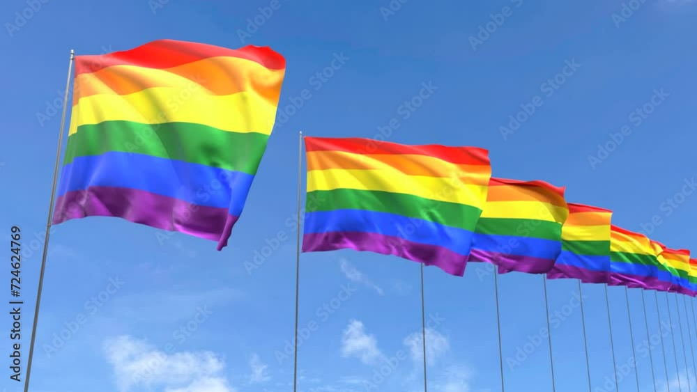 Looping video of Rainbow flag Waving on blue sky background, Loop Animation LGBT Pride flag Looping video of Rainbow flag Waving on blue sky background, Loop Animation LGBT Pride flag