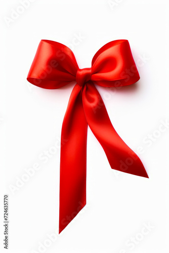 Red bow with long tail on white background with clipping path.