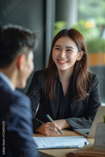 Asian businesspeople discussing and brainstorm about their projects together in meeting room. Business startup teamwork concept