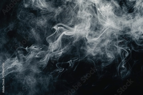 Flowing abstract fog or mist texture with smoke effect on black background