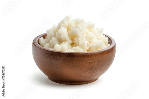 Lard filled bowl on white surface photo