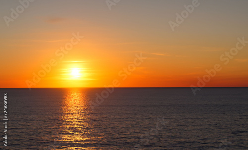 a beautiful sunset at sea on the island of Aruba generated with artificial intelligence © gustavo