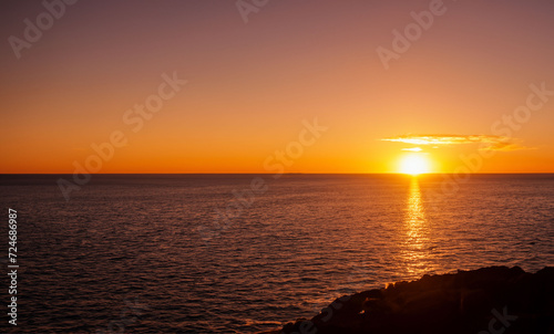 a beautiful sunset at sea on the island of Aruba generated with artificial intelligence © gustavo