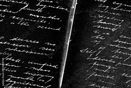 Fototapeta Parts of a handwritten text written. The paper and writing are more than eighty year old. The colours are converted to black and white negative