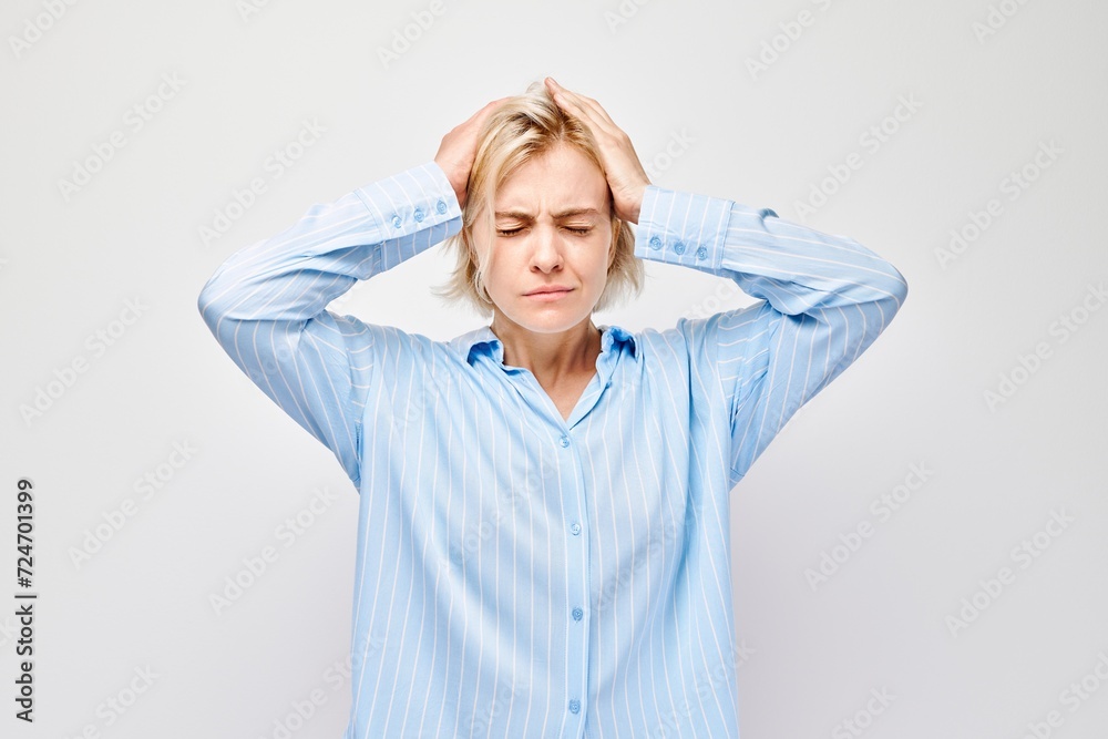 Portrait of tired girl with sad face feeling emotional burnout on white background. Nerves, stress, uncertainty concept. Portrait of tired girl with sad face feeling emotional burnout on white background. Nerves, stress, uncertainty concept.