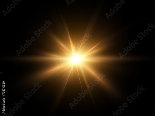 Glowing light explodes, light flash golden color. Beam of the shining sun. Special glare light effect. Bright flash.