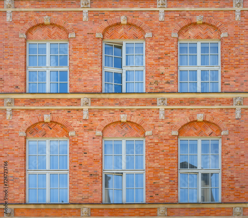 Beautiful architecture of the old town in Gdansk. Close-up with details. Bright facades of buildings. View of the Old Town. A walk through the city on a sunny summer day