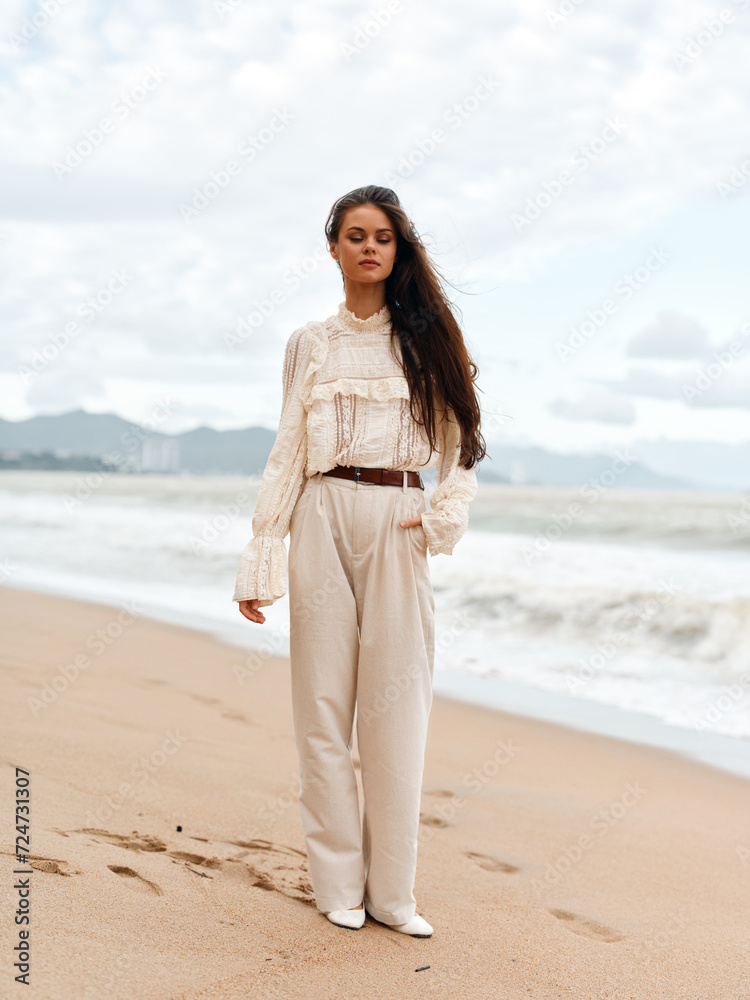 Beauty of Summer: Young, Attractive Caucasian Female Enjoying a Beach Vacation under the Sunny Blue Sky. Beauty of Summer: Young, Attractive Caucasian Female Enjoying a Beach Vacation under the Sunny Blue Sky.