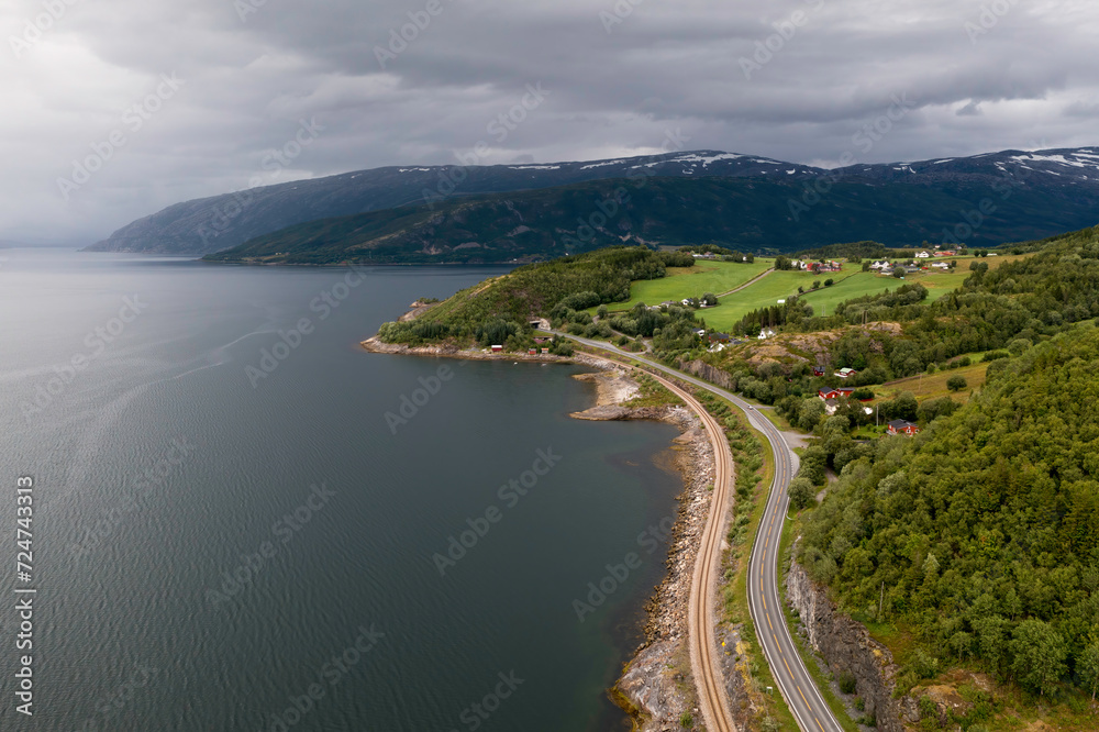 Aerial View of a Coastal Road next to a Railway in Northern Norway Aerial View of a Coastal Road next to a Railway in Northern Norway