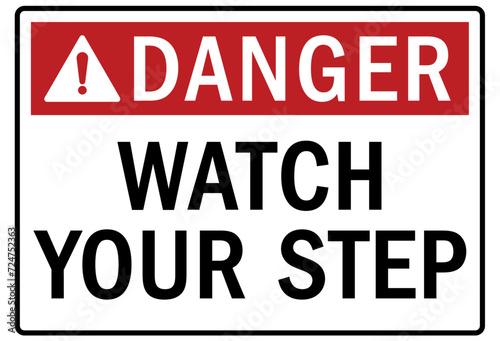 Watch your step warning sign photo