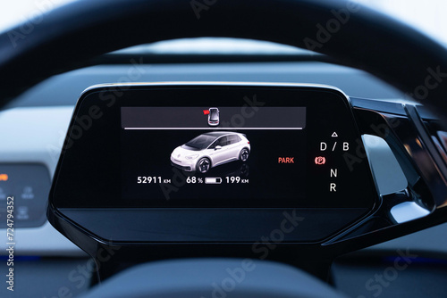 Electric Car Dashboard Charge display. Battery indicator fills up to 199 km from 0. Electric car battery indicator. Green energy in car industry. Electric car dashboard display
