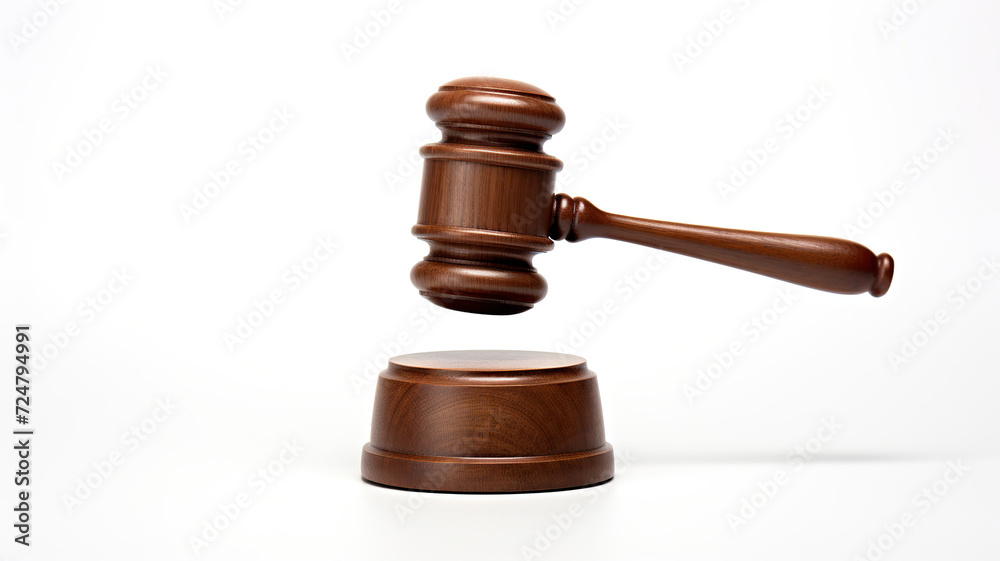 Judge's mallet isolated against a stark white background Judge's mallet isolated against a stark white background