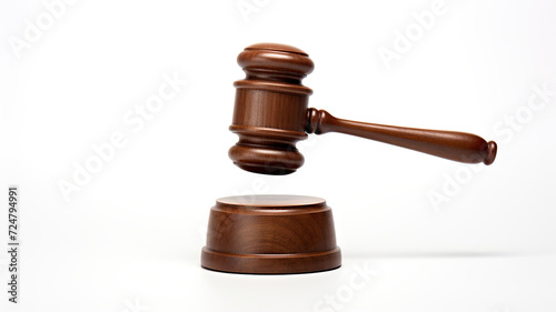 Judge's mallet isolated against a stark white background