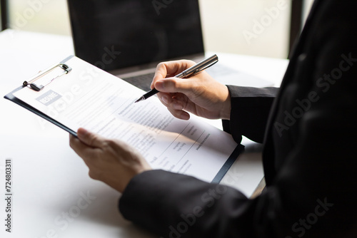 Job interview, The job applicant submits the application documents. Managers read resumes and interview new employees.