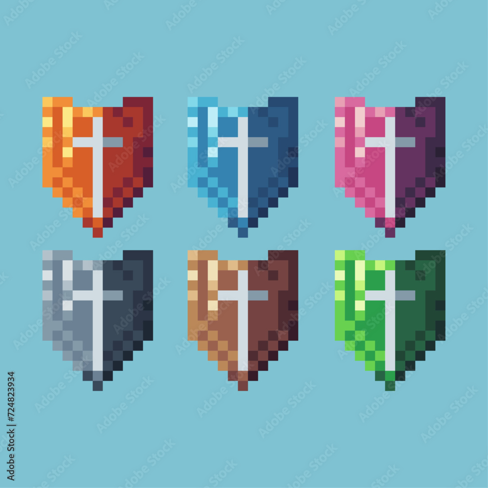 Pixel art sets icon of shield variation color.Gold shield icon on pixelated style. 8bits perfect for game asset or design asset element for your game design. Simple pixel art icon asset. Pixel art sets icon of shield variation color.Gold shield icon on pixelated style. 8bits perfect for game asset or design asset element for your game design. Simple pixel art icon asset.
