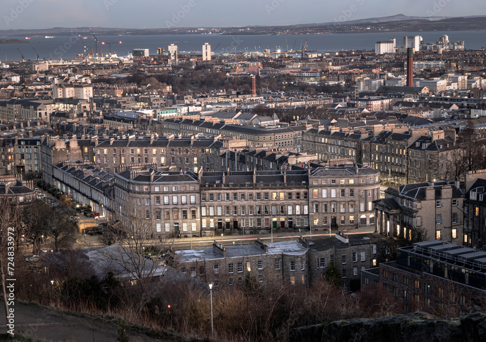 Cityscape view of Edinburgh towards Leith Docks and the Firth of Forth from Calton Hill in central Edinburgh. Destinations in Europe, Space for text, Selective focus.