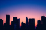 Dawn unfold over a city skyline silhouette, with towering skyscrapers in a scenic urban landscape, creating a panoramic cityscape that captures of modern architecture and professional growth.