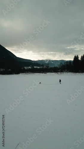 Vertical drone footage, fast mountain reveal.