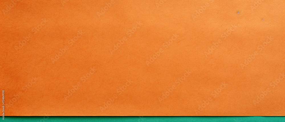 Rough kraft paper background with a textured feel in shades of orange and green, providing a vibrant and rustic backdrop. Rough kraft paper background with a textured feel in shades of orange and green, providing a vibrant and rustic backdrop.