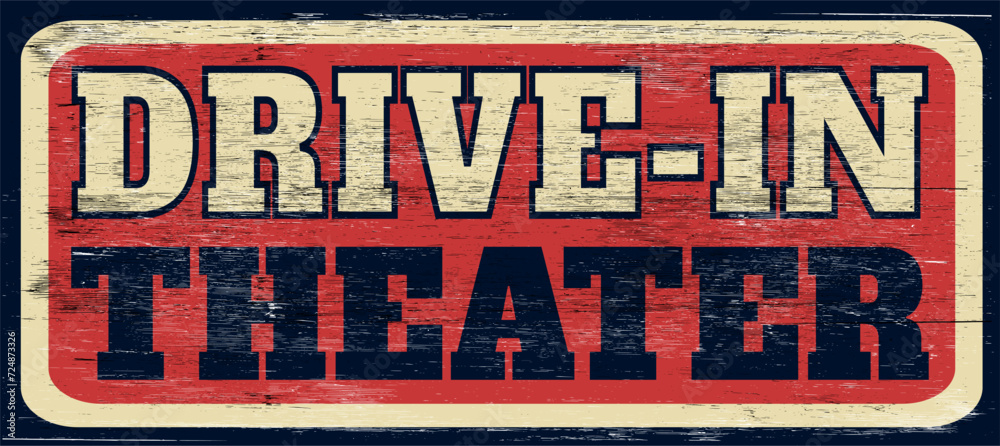 Fototapeta premium Old distressed drive-in theater sign on wood