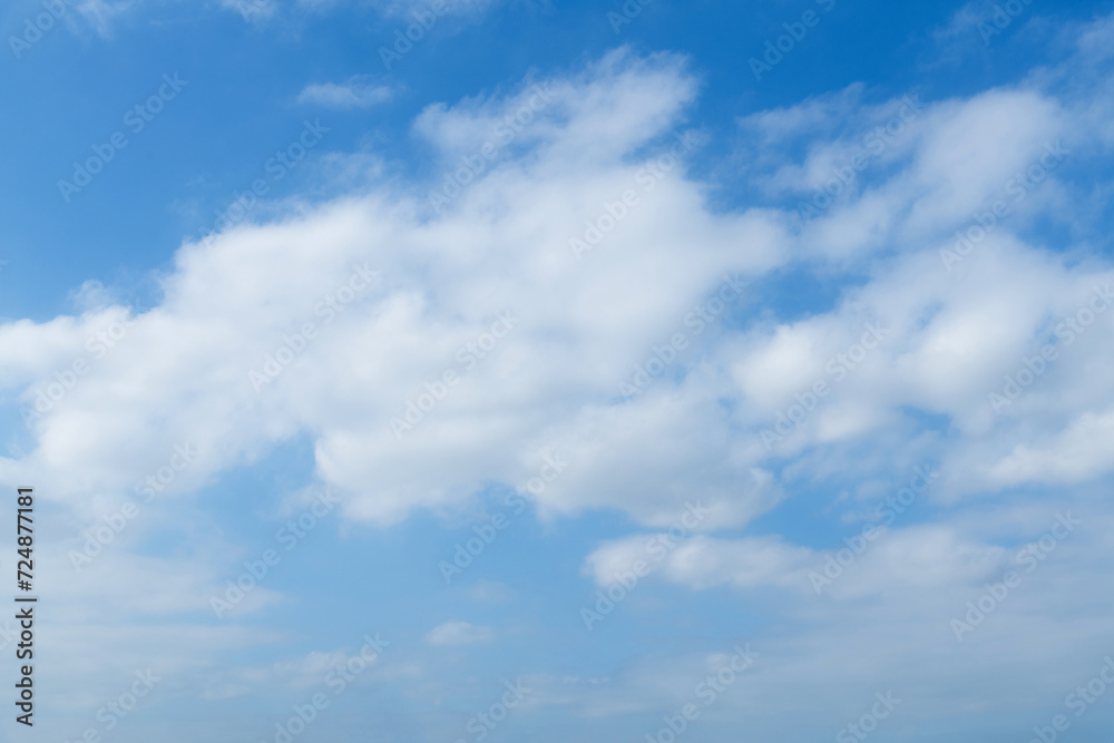 Naklejka premium Blue sky with big white clouds
