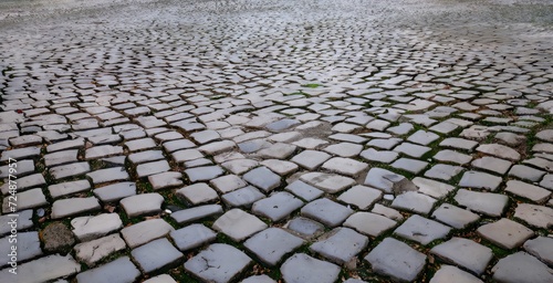 Paving in Roman cobblestones in Via Emilia porphyry. high quality photos photo